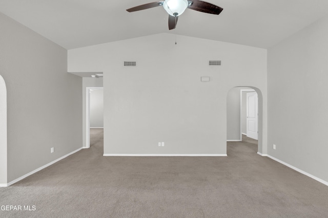 7029 Copper Canyon Dr, El Paso, TX 79934 - unfurnished room featuring arched walkways, ceiling fan, carpet floors, and high vaulted ceiling