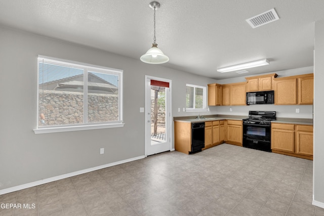 7029 Copper Canyon Dr, El Paso, TX 79934 - kitchen featuring black appliances, pendant lighting, light countertops, and a textured ceiling