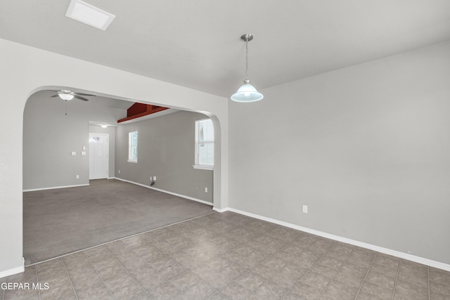 7029 Copper Canyon Dr, El Paso, TX 79934 - empty room featuring arched walkways and a ceiling fan