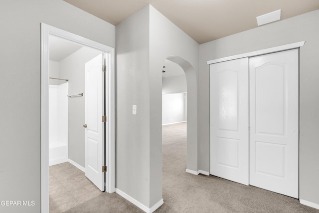 7029 Copper Canyon Dr, El Paso, TX 79934 - hall featuring arched walkways and carpet floors