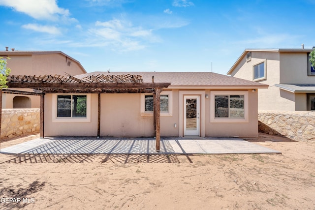 7029 Copper Canyon Dr, El Paso, TX 79934 - rear view of house featuring a patio, a pergola, and stucco siding