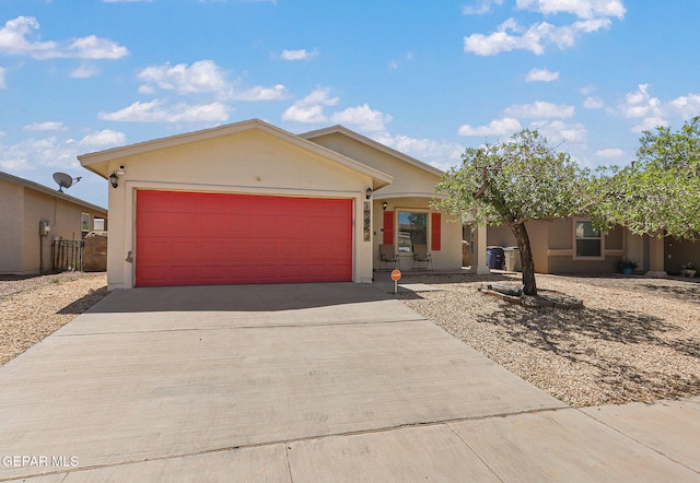 11652 Ochre Bluff Ln, El Paso, TX 79934 - ranch-style home featuring stucco siding, driveway, and an attached garage