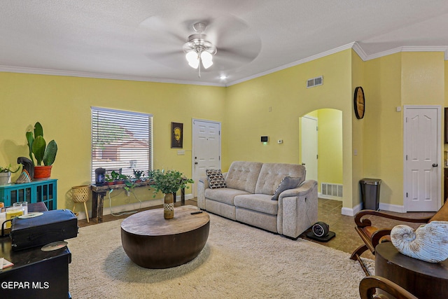 11652 Ochre Bluff Ln, El Paso, TX 79934 - living area with arched walkways, ornamental molding, and a ceiling fan