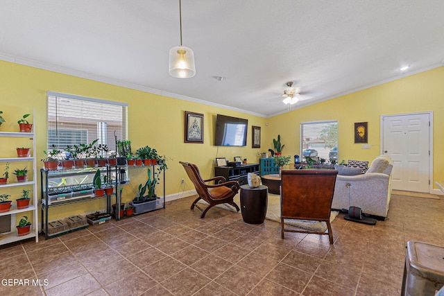 11652 Ochre Bluff Ln, El Paso, TX 79934 - living room with ornamental molding, plenty of natural light, lofted ceiling, ceiling fan, and dark tile patterned floors