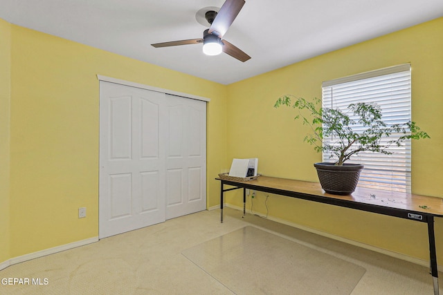 11652 Ochre Bluff Ln, El Paso, TX 79934 - carpeted home office with a ceiling fan and baseboards