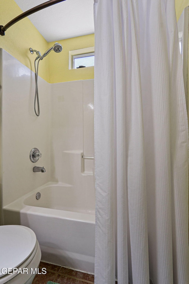 11652 Ochre Bluff Ln, El Paso, TX 79934 - bathroom with shower / tub combo and tile patterned flooring