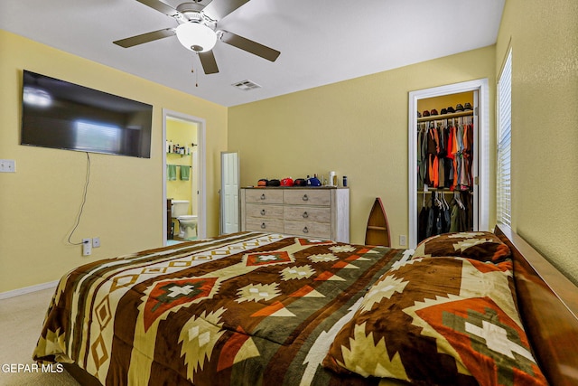 11652 Ochre Bluff Ln, El Paso, TX 79934 - bedroom with carpet floors, a walk in closet, a closet, connected bathroom, and ceiling fan