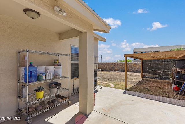 11652 Ochre Bluff Ln, El Paso, TX 79934 - fenced backyard featuring a patio