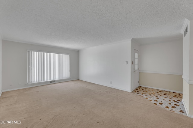3313 Dublin Rd, El Paso, TX 79925 - carpeted empty room featuring a textured ceiling and baseboards