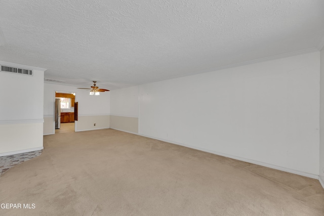 3313 Dublin Rd, El Paso, TX 79925 - unfurnished living room with ceiling fan, light colored carpet, and a textured ceiling