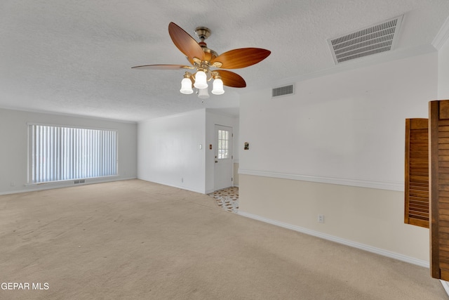 3313 Dublin Rd, El Paso, TX 79925 - unfurnished room featuring a textured ceiling, light colored carpet, and ceiling fan