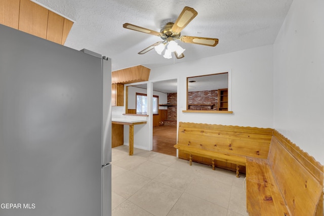 3313 Dublin Rd, El Paso, TX 79925 - hall featuring a textured ceiling and light tile patterned floors