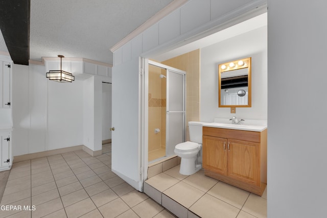 3313 Dublin Rd, El Paso, TX 79925 - bathroom with a stall shower, vanity, tile patterned flooring, and a textured ceiling