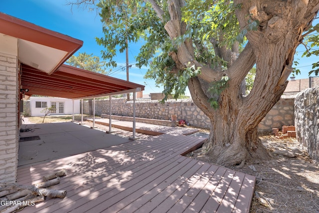 3313 Dublin Rd, El Paso, TX 79925 - wooden terrace featuring a fenced backyard and a patio