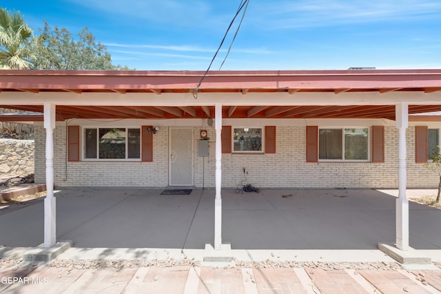 3313 Dublin Rd, El Paso, TX 79925 - rear view of house with brick siding