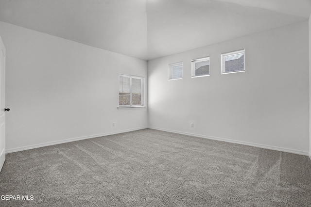 14373 Nick Drahos Ln, Horizon City, TX 79928 - carpeted spare room featuring baseboards and vaulted ceiling