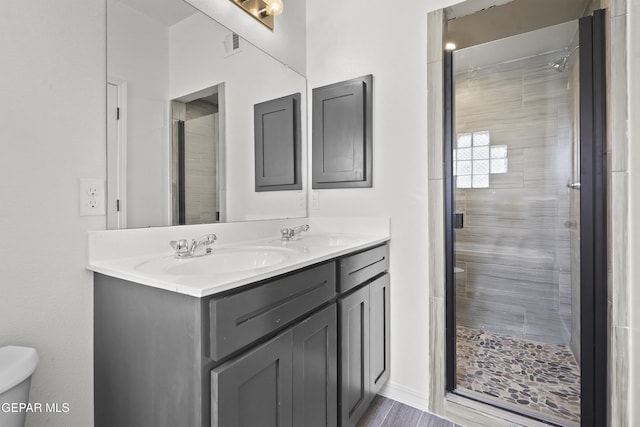 14373 Nick Drahos Ln, Horizon City, TX 79928 - full bathroom with double vanity and a shower stall