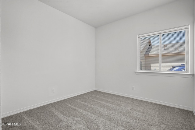 14373 Nick Drahos Ln, Horizon City, TX 79928 - carpeted empty room with baseboards