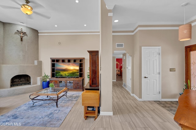 981 Vereda Del Valle Ave, El Paso, TX 79932 - living area featuring a premium fireplace, ornamental molding, wood finish floors, a towering ceiling, and a ceiling fan