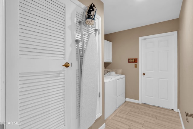 981 Vereda Del Valle Ave, El Paso, TX 79932 - laundry area featuring independent washer and dryer and cabinet space