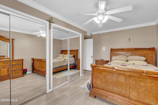981 Vereda Del Valle Ave, El Paso, TX 79932 - bedroom with multiple closets, crown molding, a ceiling fan, and light wood finished floors