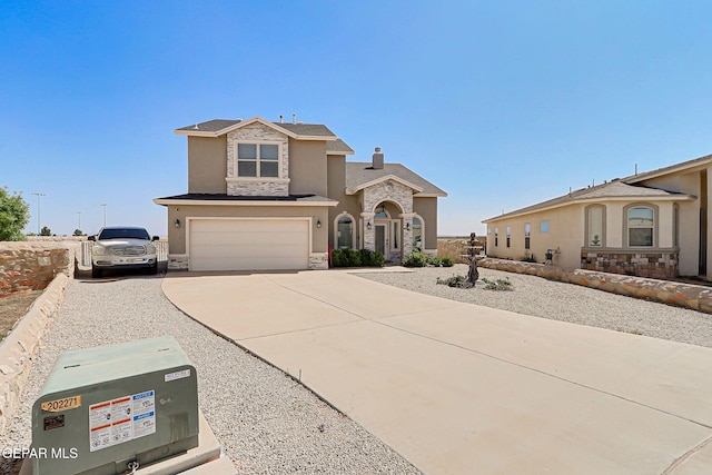 13847 Alamito Creek Ave, Clint, TX 79836 - view of front of home with stone siding, stucco siding, a garage, concrete driveway, and a chimney