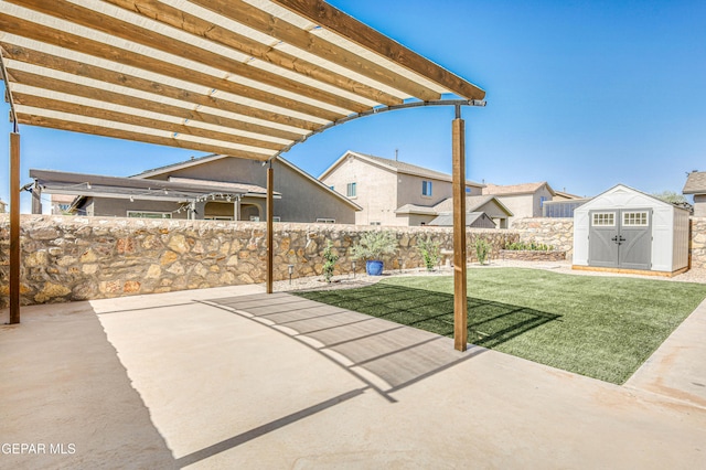14936 Ted Banks Ave, El Paso, TX 79938 - fenced backyard with a patio area and a shed