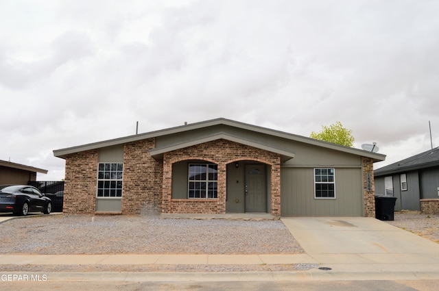 14309 Desierto Bueno Ave, Horizon City, TX 79928 - ranch-style home with concrete driveway and brick siding