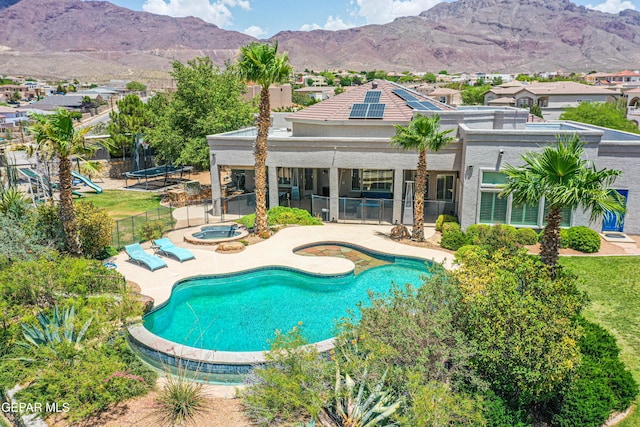 1348 Franklin Wind Place, El Paso, TX 79912 - view of pool featuring an in-ground hot tub, a patio, a fenced backyard, and a mountain view