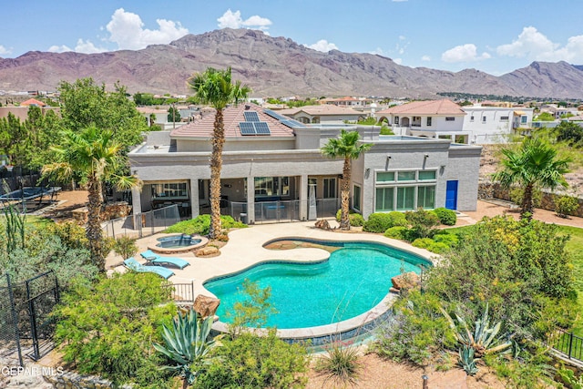 1348 Franklin Wind Place, El Paso, TX 79912 - view of pool with an in-ground hot tub, a fenced backyard, a patio area, and a mountain view