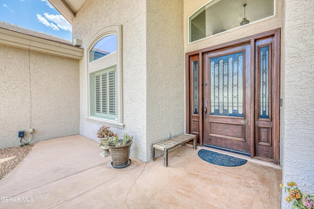 1348 Franklin Wind Place, El Paso, TX 79912 - doorway to property featuring stucco siding