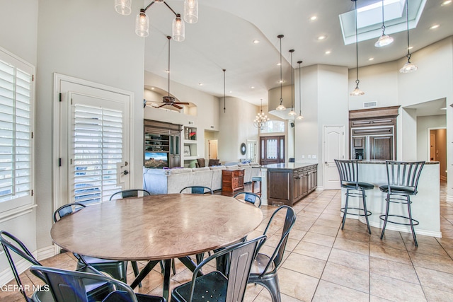 1348 Franklin Wind Place, El Paso, TX 79912 - dining room with a high ceiling, healthy amount of natural light, recessed lighting, and ceiling fan