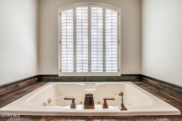 1348 Franklin Wind Place, El Paso, TX 79912 - bathroom featuring a tub with jets