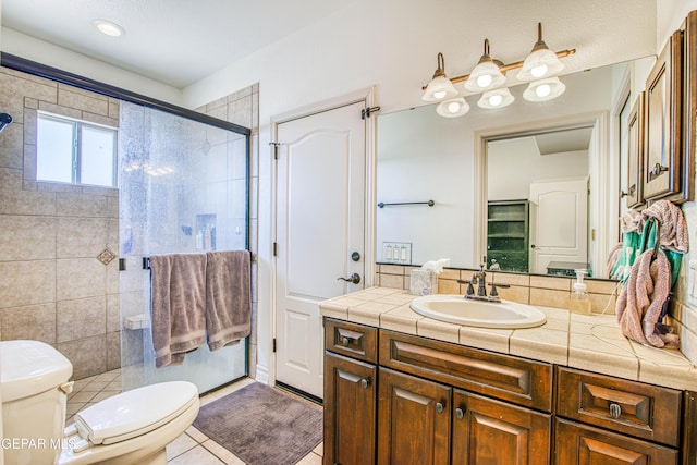 1348 Franklin Wind Place, El Paso, TX 79912 - bathroom featuring vanity, a stall shower, and tile patterned floors
