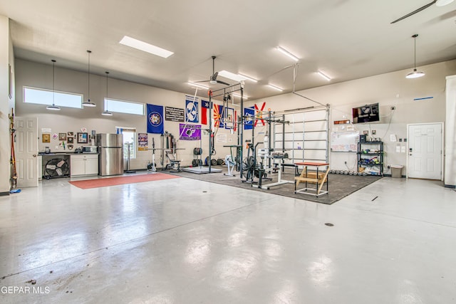 1348 Franklin Wind Place, El Paso, TX 79912 - garage with freestanding refrigerator