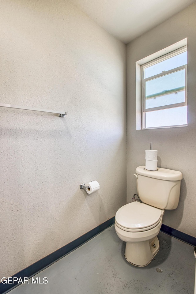 1348 Franklin Wind Place, El Paso, TX 79912 - bathroom with toilet and concrete floors