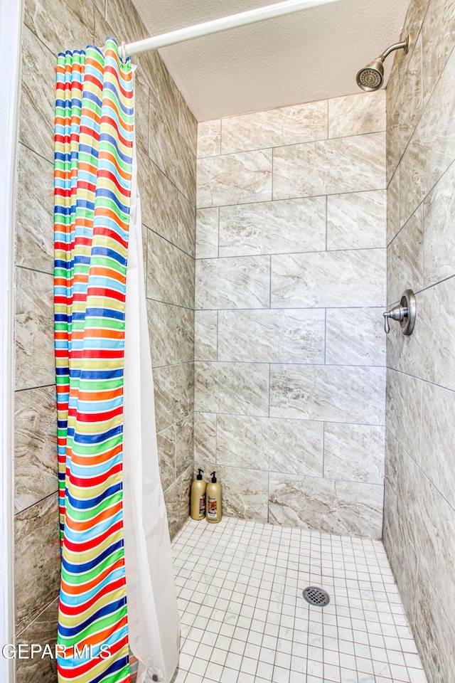 1348 Franklin Wind Place, El Paso, TX 79912 - bathroom featuring tiled shower