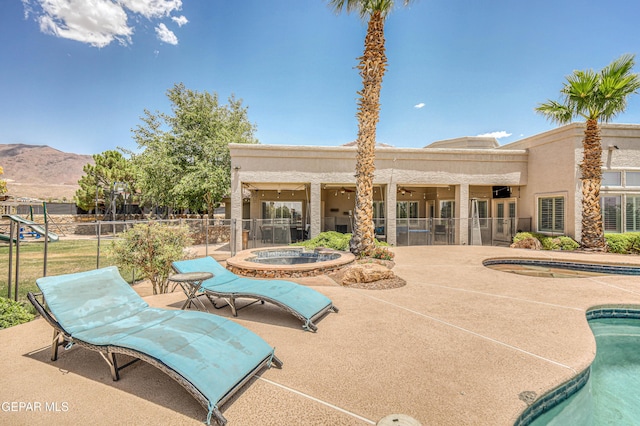1348 Franklin Wind Place, El Paso, TX 79912 - view of pool with an in-ground hot tub, a patio, and a mountain view