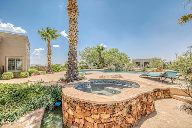 1348 Franklin Wind Place, El Paso, TX 79912 - outdoor pool featuring an in-ground hot tub and a patio