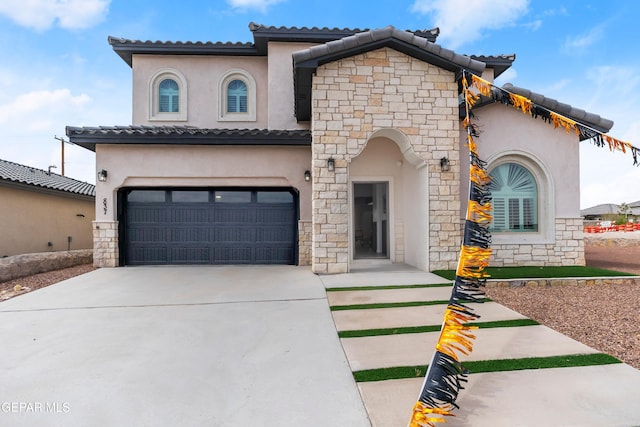 769 Cedarwood Dr, El Paso, TX 79928 - view of front of property featuring stucco siding, an attached garage, and driveway