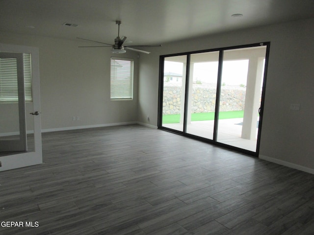 205 Staffs Way, El Paso, TX 79928 - unfurnished room featuring plenty of natural light, ceiling fan, and dark wood-type flooring