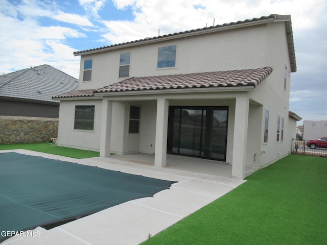 205 Staffs Way, El Paso, TX 79928 - rear view of house featuring a patio, stucco siding, and a tiled roof