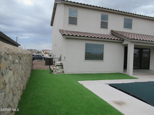 205 Staffs Way, El Paso, TX 79928 - rear view of property featuring a tiled roof, a patio, and stucco siding