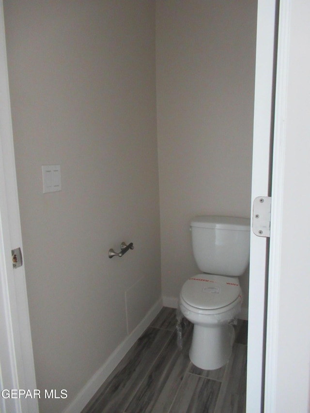 205 Staffs Way, El Paso, TX 79928 - bathroom with toilet and wood finished floors