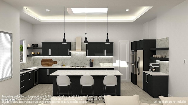 7376 Cimarron Rim Dr, El Paso, TX 79911 - kitchen featuring dark cabinetry and wall chimney exhaust hood