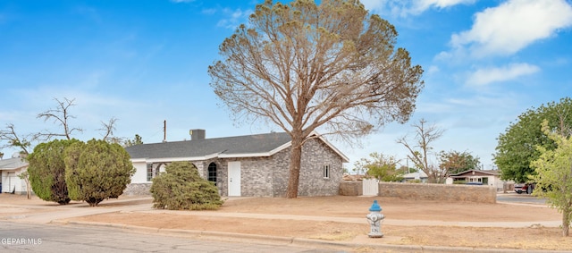 8936 Mount Rushmore Ln, El Paso, TX 79904 - ranch-style home with brick siding and a chimney