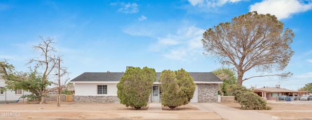 8936 Mount Rushmore Ln, El Paso, TX 79904 - view of front of house featuring stucco siding and stone siding