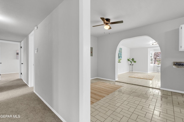 8936 Mount Rushmore Ln, El Paso, TX 79904 - hallway featuring arched walkways and baseboards