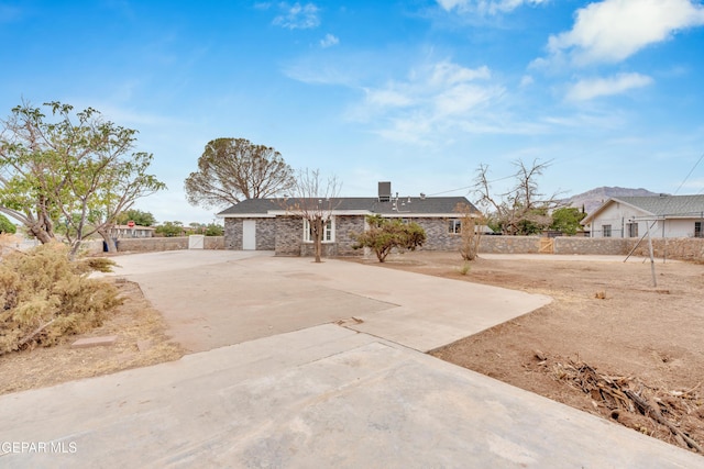 8936 Mount Rushmore Ln, El Paso, TX 79904 - single story home featuring stone siding
