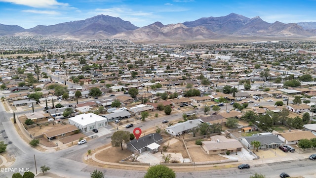 8936 Mount Rushmore Ln, El Paso, TX 79904 - aerial view of property's location with a mountain backdrop and nearby suburban area